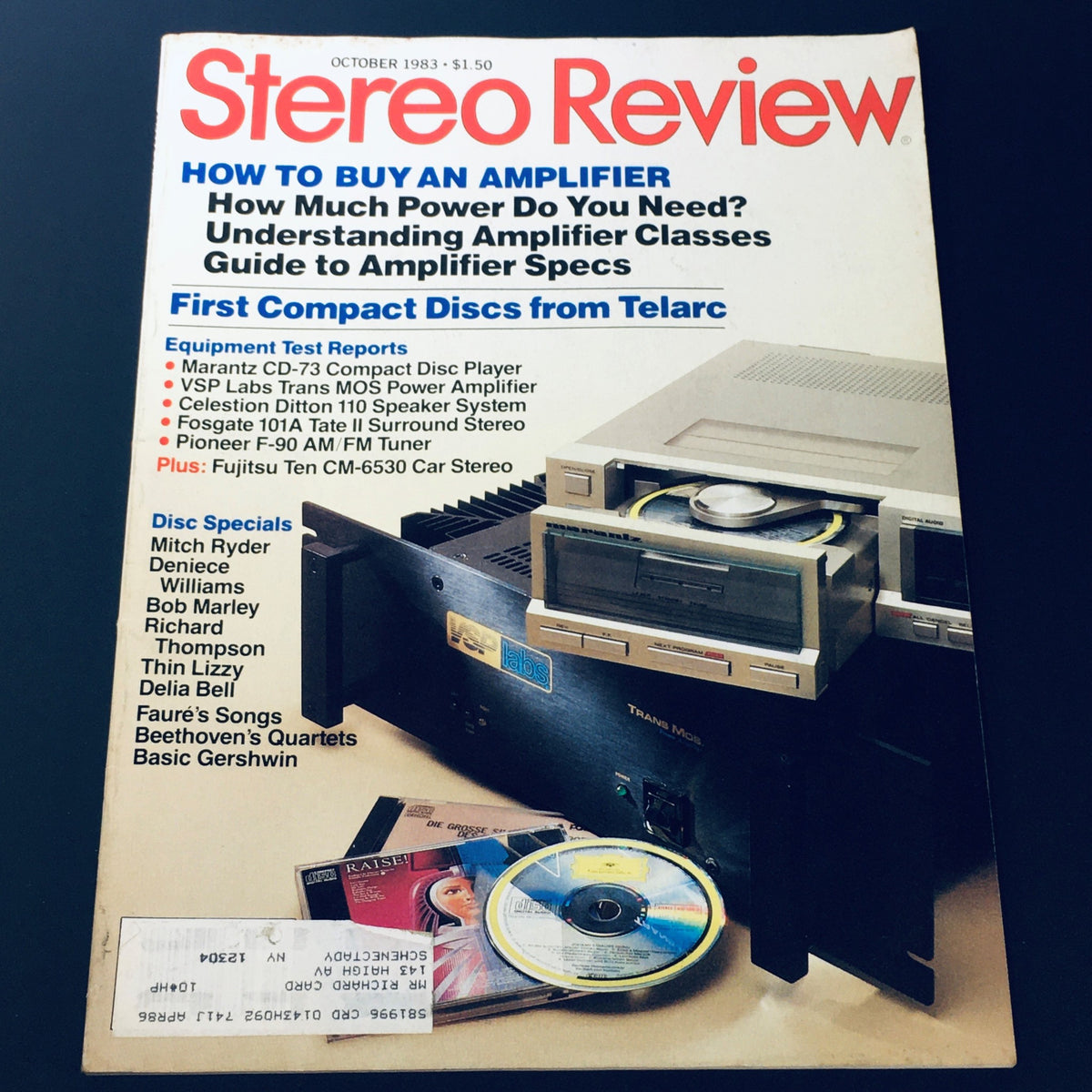 Cover of the VTG Stereo Review Magazine, October 1983 issue, featuring music articles and highlights on Mitch Ryder and Deniece Williams. The cover includes headings on amplifier buying guides and compact discs, showcasing a retro audio setup with record players and CDs. Perfect for vintage magazine collectors and music enthusiasts.