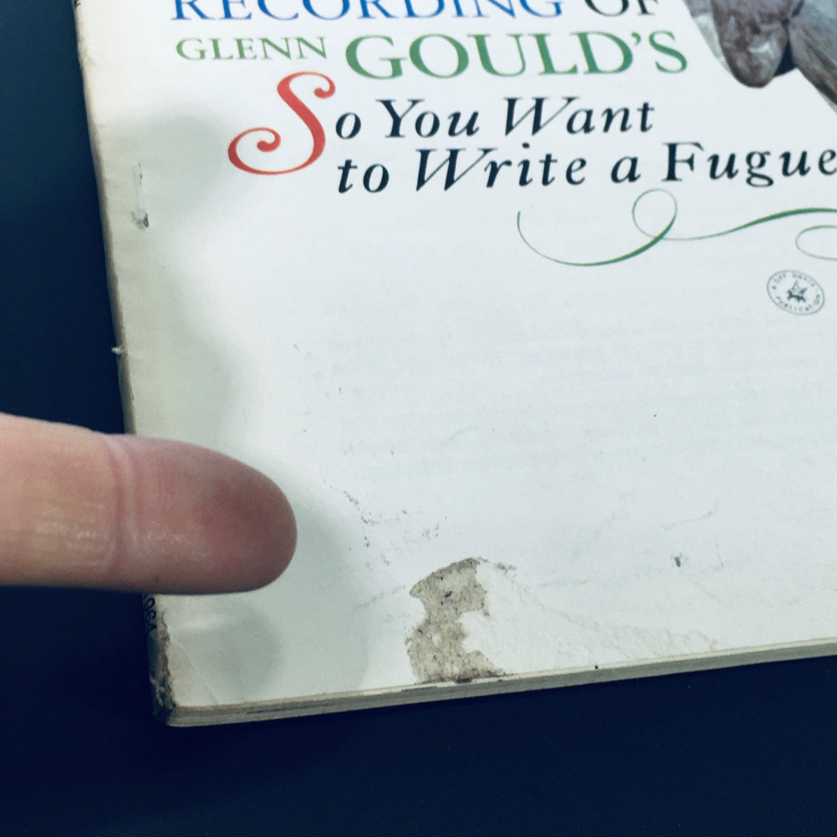 Close-up view of the HiFi Stereo Review Magazine from April 1964, showing details of the cover, including mention of an exclusive recording of Glenn Gould's 'So You Want to Write a Fugue'.