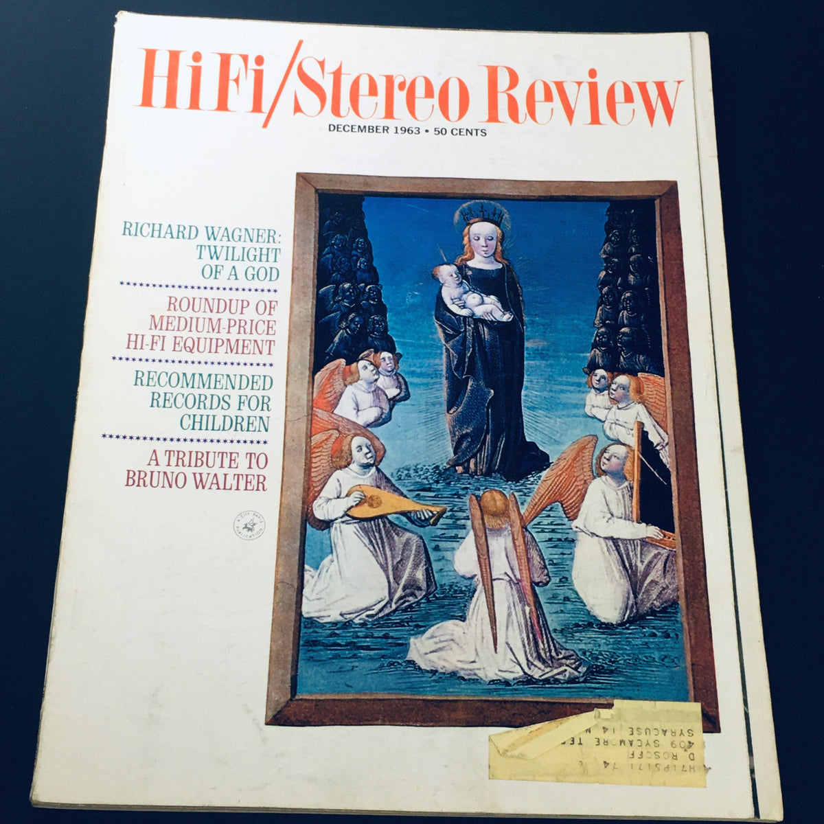 Cover of the VTG HiFi Stereo Review Magazine December 1963 featuring Richard Wagner and Bruno Walter. The cover includes illustrations of angels and a Madonna, showcasing the fusion of classical music with hi-fi culture.