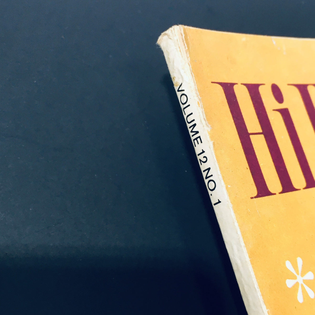 Spine of VTG HiFi Stereo Review Magazine January 1964 showing volume 12, no. 1, indicative of its vintage nature and collection value.