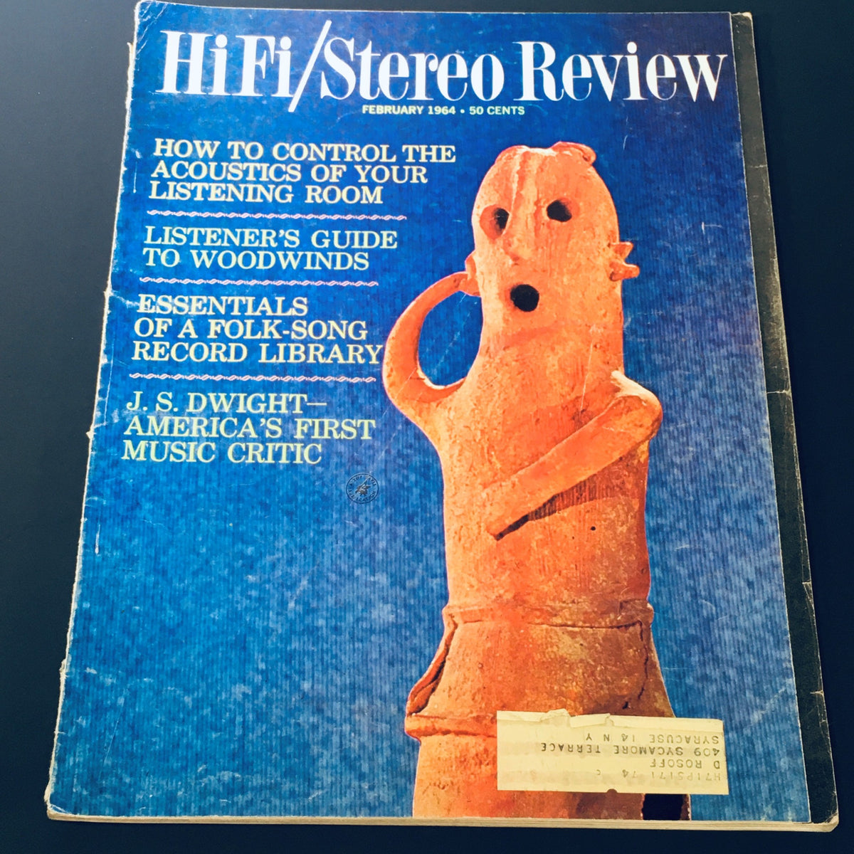Cover of the VTG HiFi Stereo Review Magazine from February 1964 featuring J.S. Dwight, America's music critic. The cover showcases topics like acoustics and folk-song records against a blue background.