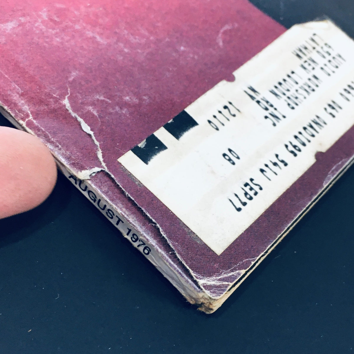 Close-up of the spine of VTG Stereo Review Magazine August 1976, displaying the publication date and the vintage address label, highlighting its authenticity.