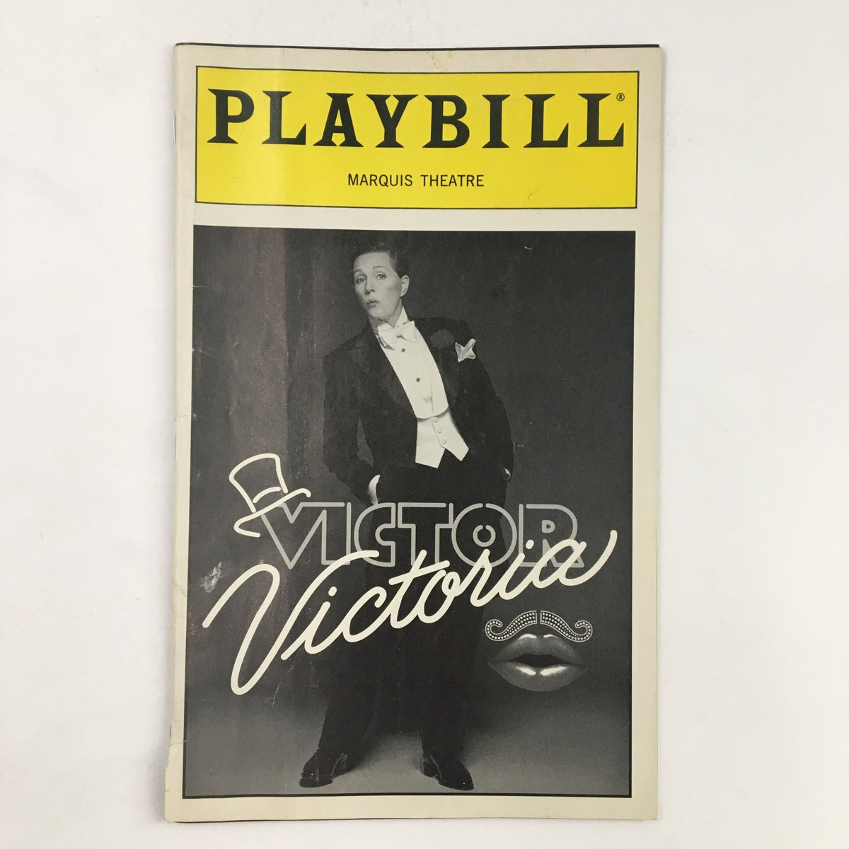 1996 Playbill for Victor/Victoria featuring Julie Andrews at the Marquis Theatre, showcasing a stylish black and white cover design with elegant typography.