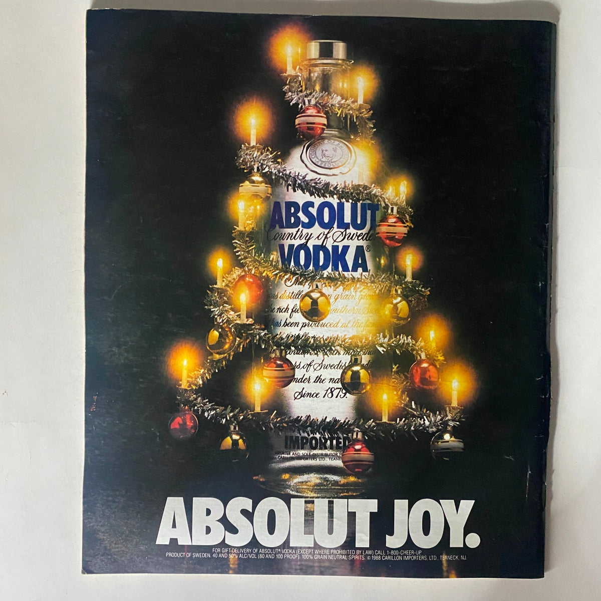 Back cover of VTG Spin Magazine December 1989 featuring an advertisement for Absolut Vodka, contributing to the vintage aesthetic of the magazine.