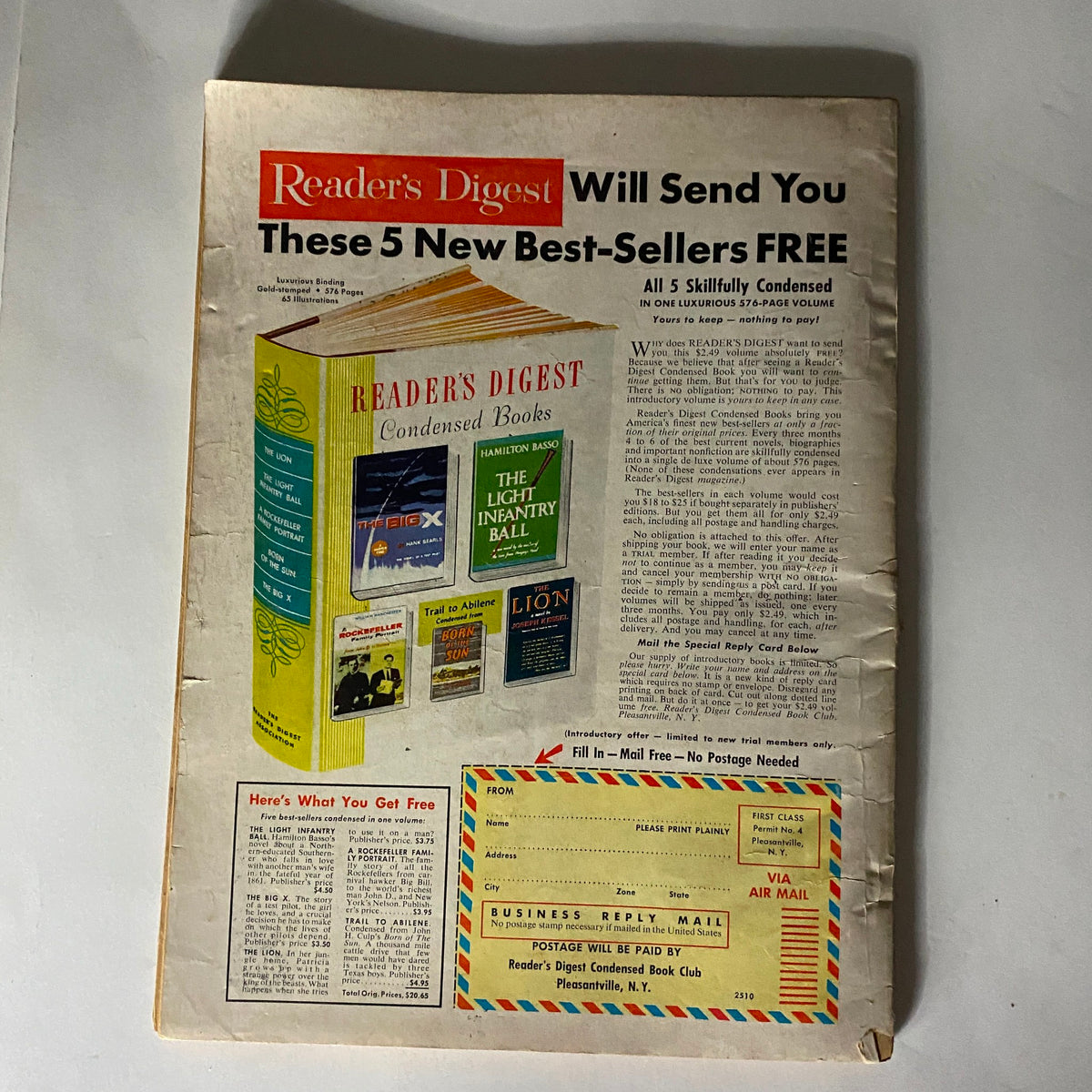 Back cover of VTG Redbook Magazine October 1959 advertising Reader's Digest Condensed Books with colorful graphics and promotional details.