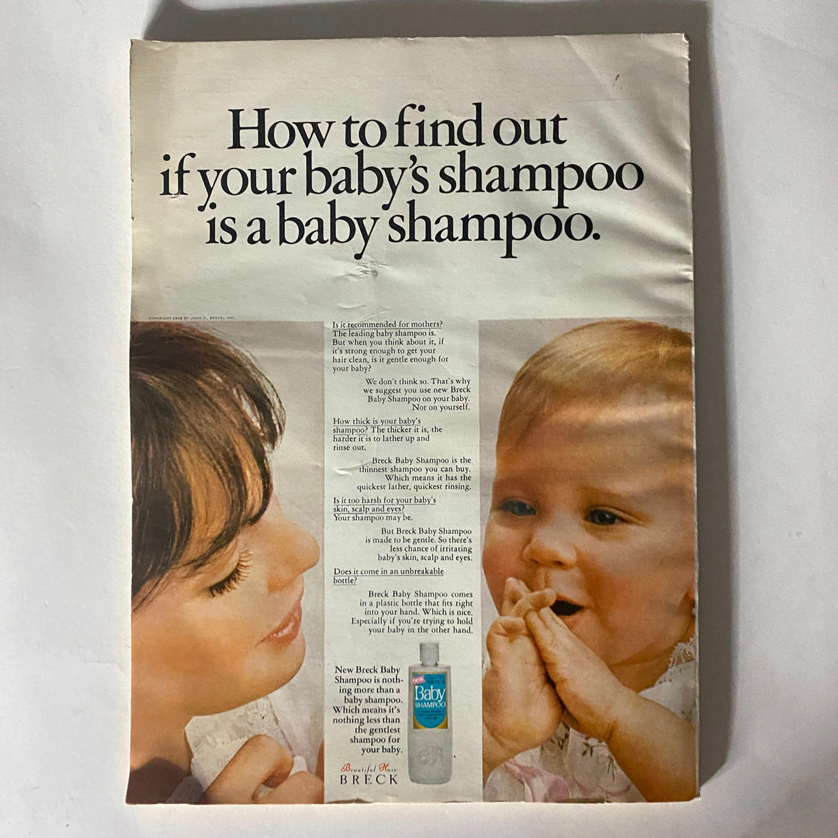 Advertisement from VTG Redbook Magazine January 1969, promoting Breck Baby Shampoo with visuals of a mother and her baby reflecting care and product safety.