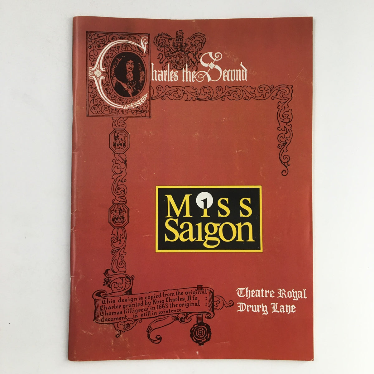 Cover of the 1989 Theatre Royal Drury Lane Cameron Mackintosh production of Miss Saigon, featuring a decorative design in red and gold.