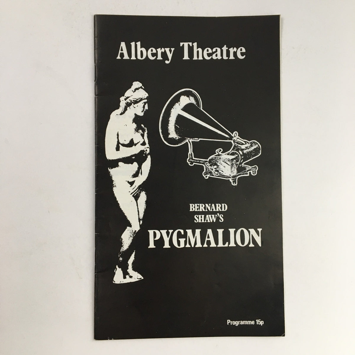 Cover of the 1974 Alberty Theatre presentation of Bernard Shaw's Pygmalion featuring a statue and gramophone design.