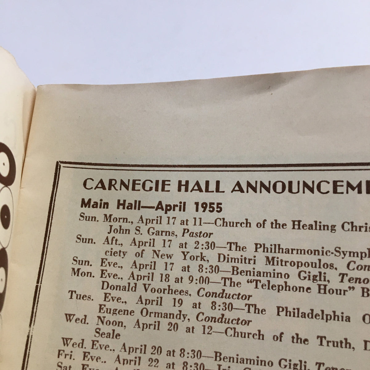 Another page from the 1955 Carnegie Hall Philharmonic-Symphony Society detailing concert announcements for April 1955, highlighting conductor Dimitri Mitropoulos.