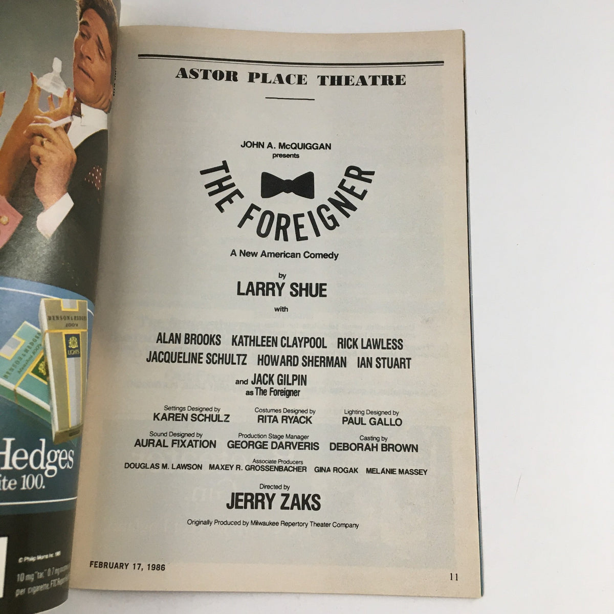 1986 Playbill for 'The Foreigner' by Larry Shue at Astor Palace Theatre, showcasing the cast and crew details including Ann Brooks and Kathleen Claypool, dated February 17, 1986.