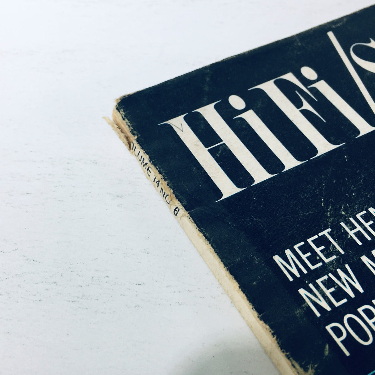 Detailed view of the spine of VTG HiFi Stereo Review Magazine June 1965, highlighting the title and volume information along with signs of vintage wear.