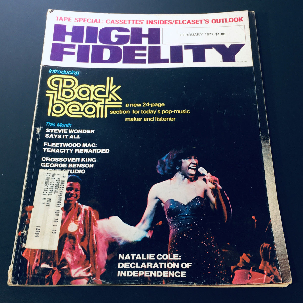 Cover of the VTG High Fidelity Magazine from February 1977 featuring Natalie Cole and Stevie Wonder, showcasing vibrant colors and design typical of the 1970s music scene.