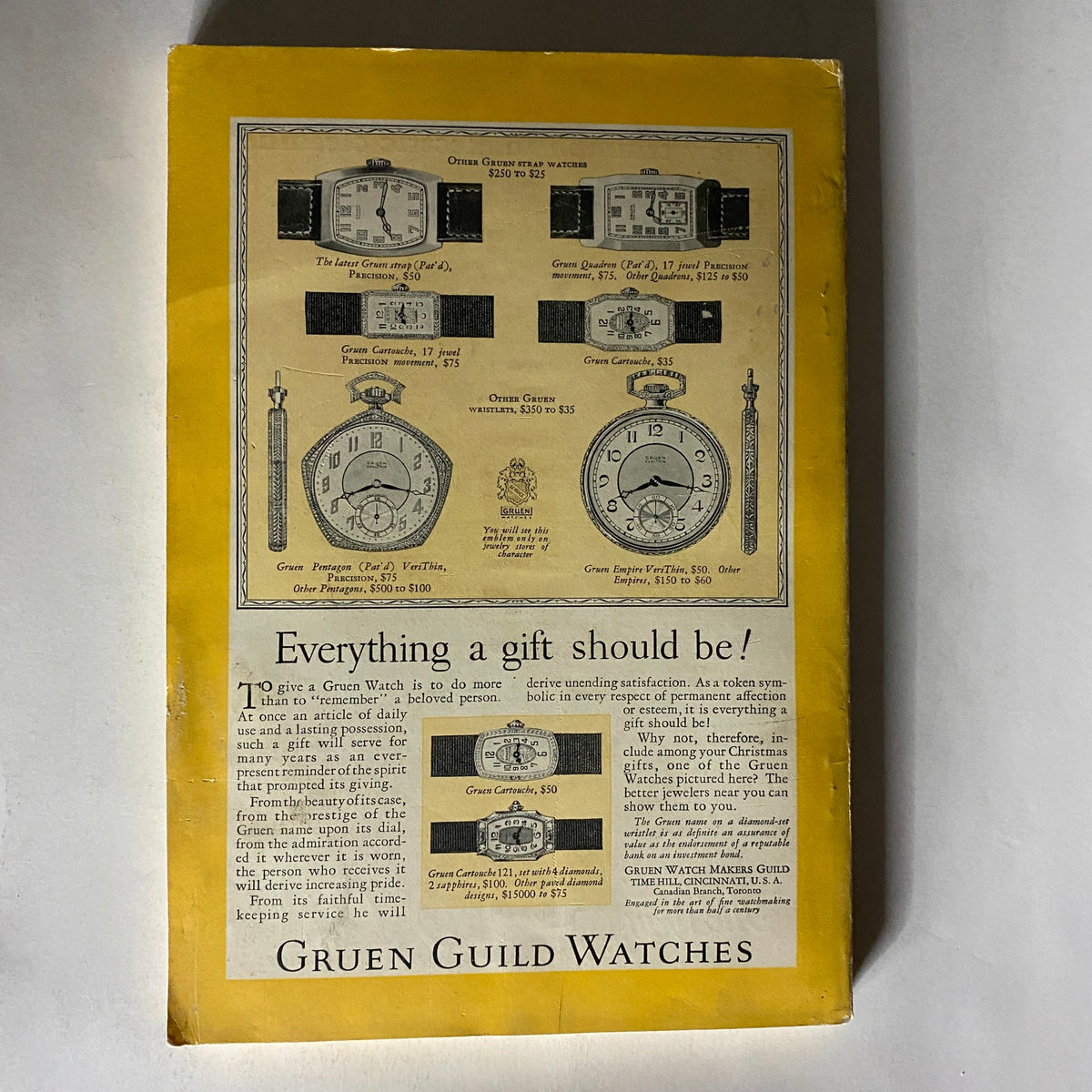Back cover of the Vintage National Geographic Magazine from November 1926 titled 'Russia of the Hour', featuring an advertisement for Gruen Guild Watches, showcasing various timepiece designs and the slogan 'Everything a gift should be!'. This magazine is ideal for collectors and history enthusiasts.