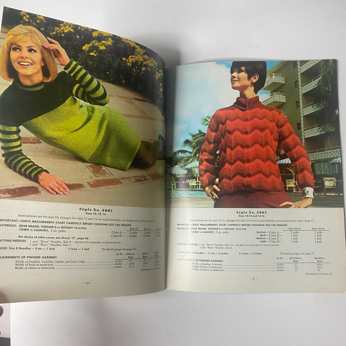 1968 Vol 38 Couture Handknits Catalog presenting two models in bold knitwear designs; one in a striped green and black sweater, and the other in a red and orange patterned sweater, highlighting vintage fashion inspirations.