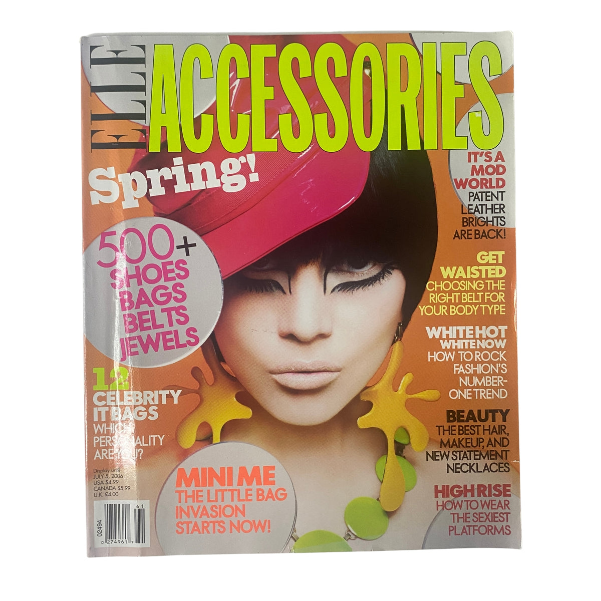 2006 Elle Accessories Spring Catalog cover featuring a model with a bold hairstyle and bright accessories, highlighting featured trends in fashion including shoes, bags, belts, and jewelry.