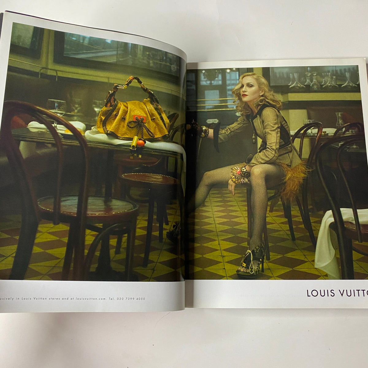 Interior page from the 2009 First Love Spring and Summer Catalog featuring another striking Louis Vuitton advertisement with a model elegantly posed in a refined environment.