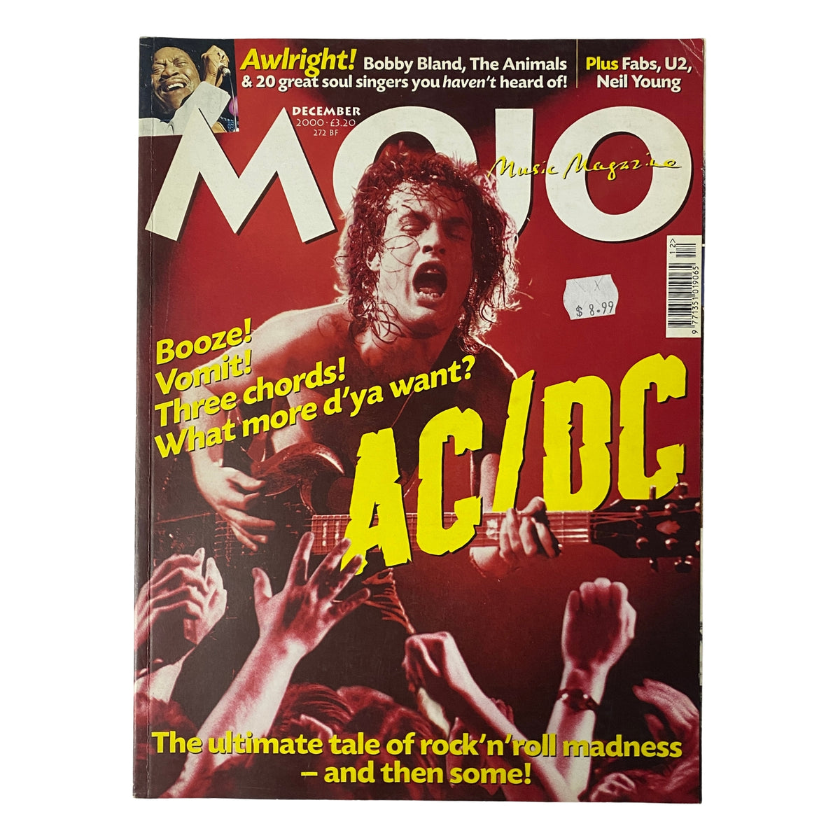 Mojo Music Magazine December 2000 cover featuring AC/DC, showcasing dynamic guitar imagery with the headline 'The ultimate tale of rock’n’roll madness' and highlights on Bobby Bland and The Animals.