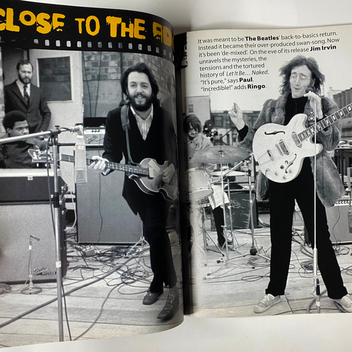 Spread in Mojo Music Magazine December 2003 discussing The Beatles' return with 'Let It Be… Naked,' with images of band members and quotes from Jim Irvin and Ringo Starr.