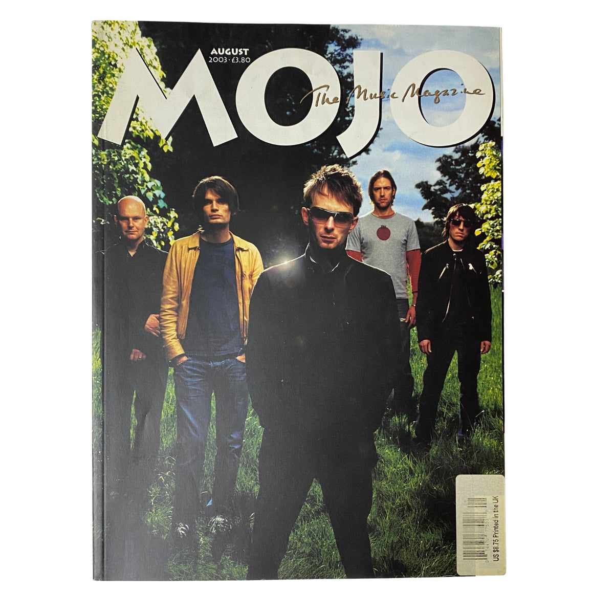 Mojo Music Magazine August 2003 featuring Radiohead on the cover, showcasing the band in a scenic outdoor setting.