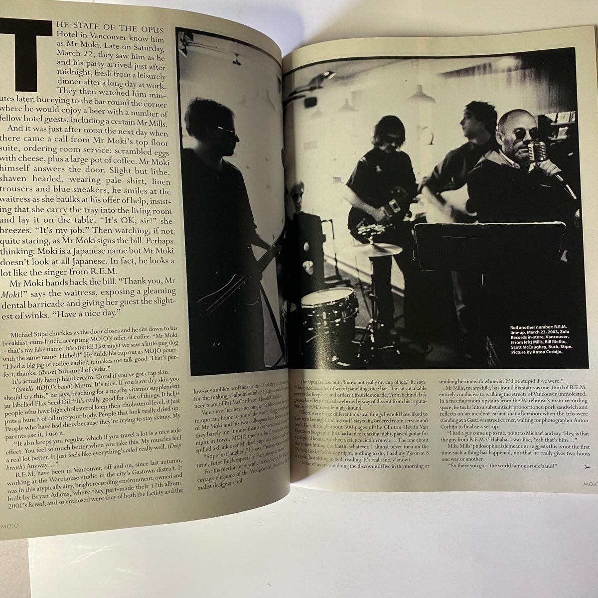 A black and white image from Mojo Music Magazine July 2003 showing R.E.M. in a recording studio, accompanied by an article discussing their creative process and musical journey over the last 20 years.