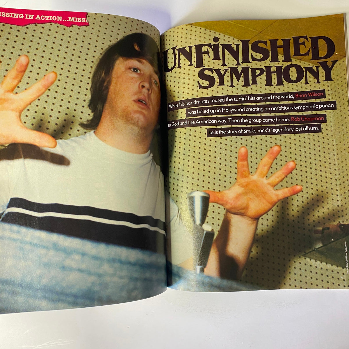 Interior page from Mojo Music Magazine February 2002 detailing Brian Wilson's 'Smile' project, featuring an image of Wilson in the studio with the headline 'Unfinished Symphony'.