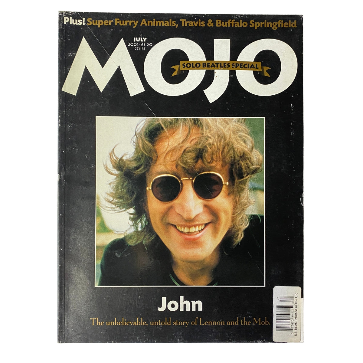 Mojo Music Magazine July 2001 cover featuring John Lennon, showcasing his iconic style with round sunglasses and a smile, highlighting the Solo Beatles Special.