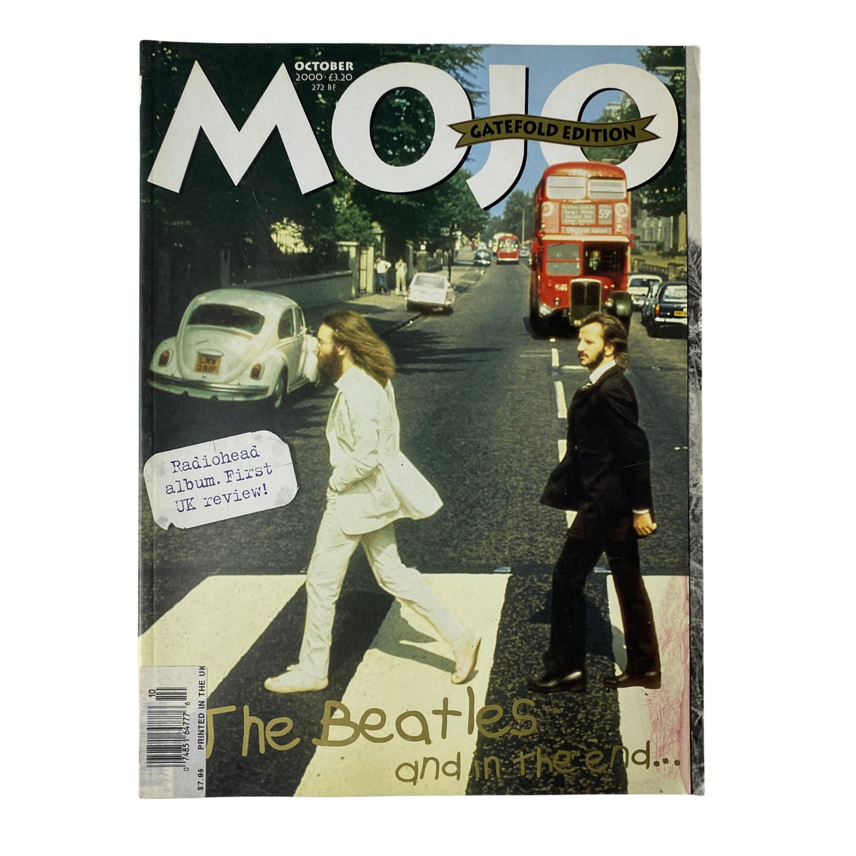 Cover of Mojo Music Magazine October 2000 featuring The Beatles, showcasing them on Abbey Road with vibrant colors.