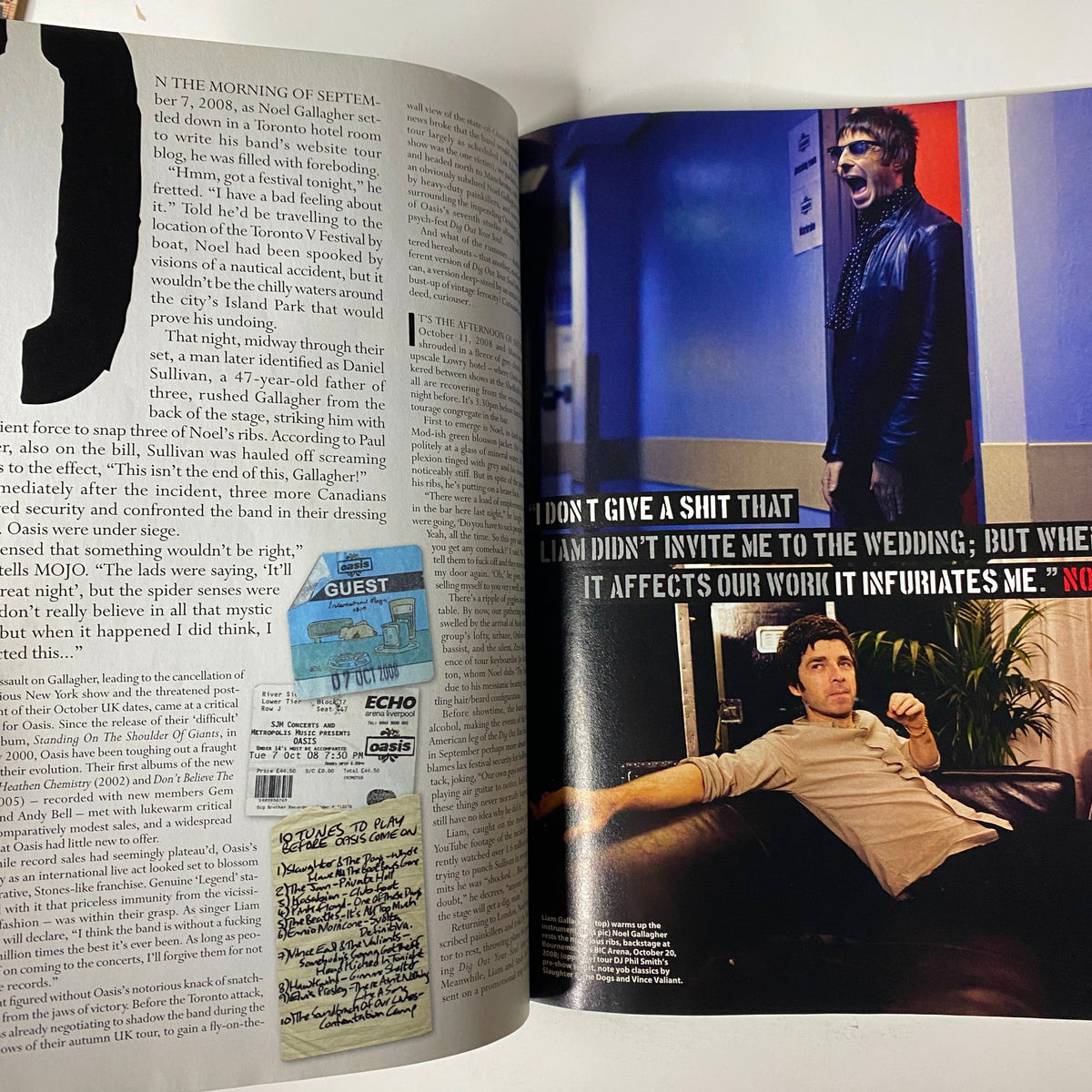 Another interior page of Mojo Music Magazine January 2009, featuring an article excerpt discussing the relationship between Noel and Liam Gallagher, with visual elements related to their music.