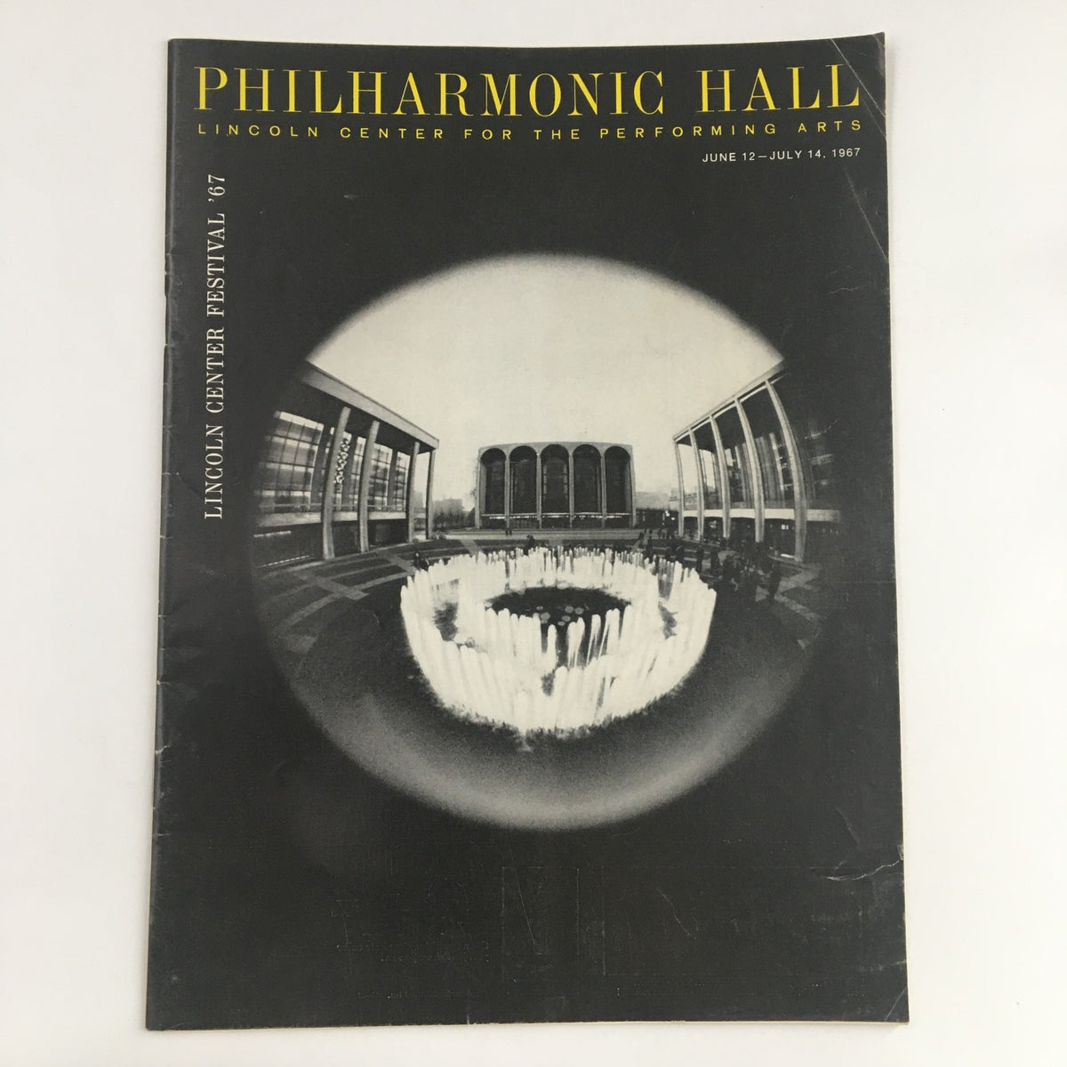 Cover of the 1967 magazine featuring the title 'PHILHARMONIC HALL LINCOLN CENTER FOR THE PERFORMING ARTS' and details for Lincoln Center Festival with a photograph of the hall.