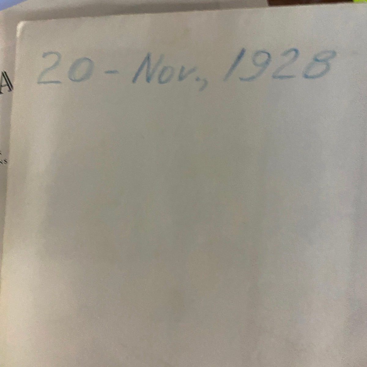 Inside page of the National Geographic Magazine November 1928 showing the date written in pencil, indicating its publication month and year.