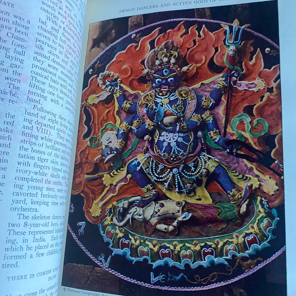 Vibrant illustration in the National Geographic Magazine November 1928 Eastern Hemisphere Supplement, depicting Demon Dancers and Butter Gods of China, showcasing cultural artistry.