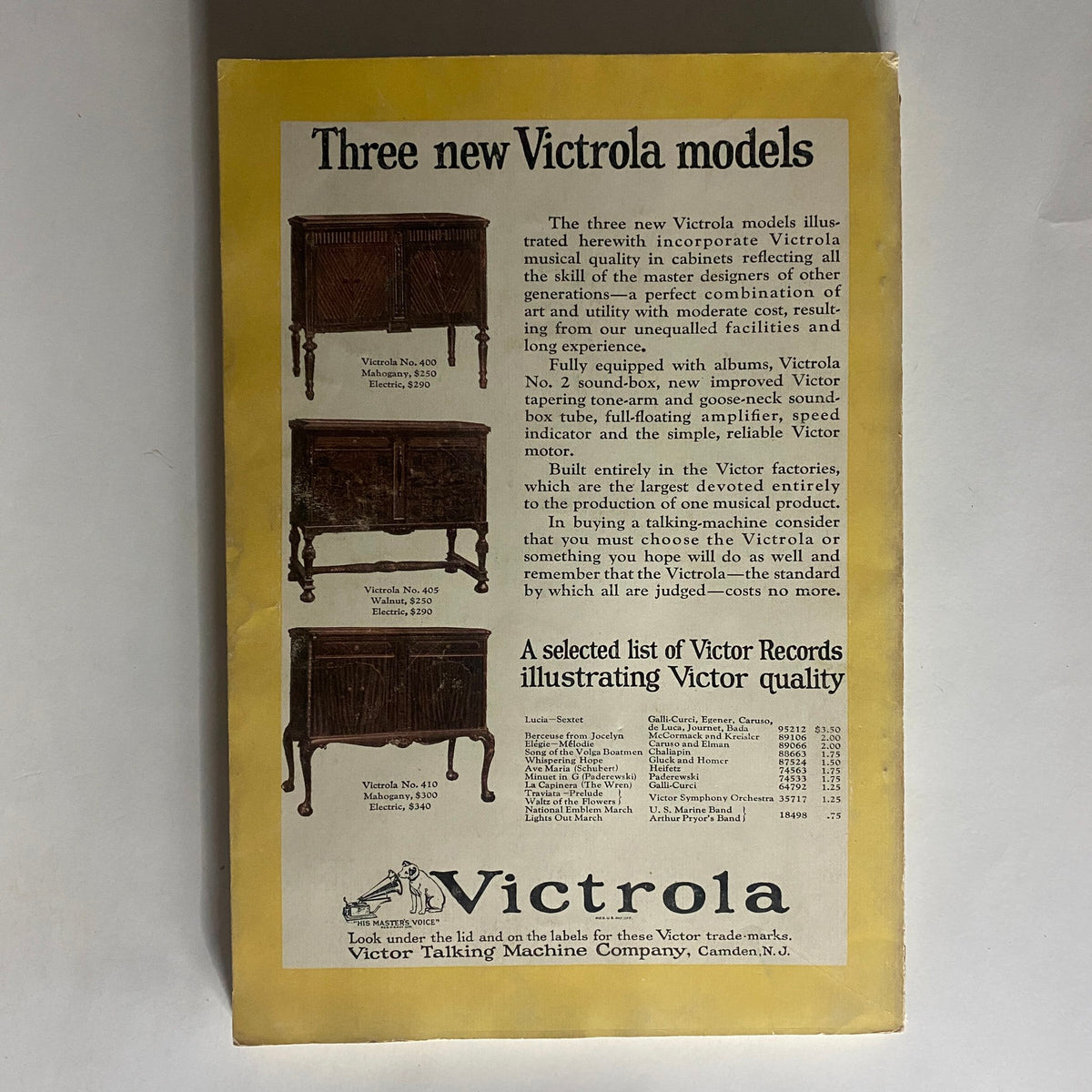Advertisement for three new Victrola models from National Geographic Magazine September 1923, showcasing the musical quality and design of each model with pricing details.