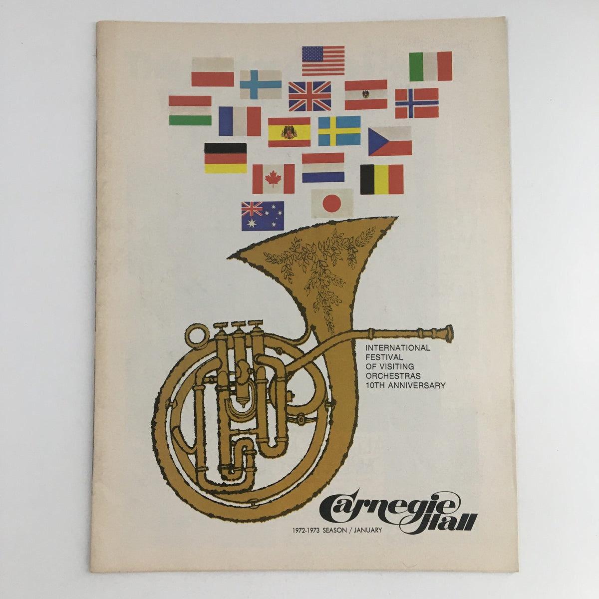 Cover of 1972 International Festival Carnegie Music at Marlboro by Robert Jacobson featuring a gold horn and flags from various countries, celebrating the 10th anniversary of the festival.