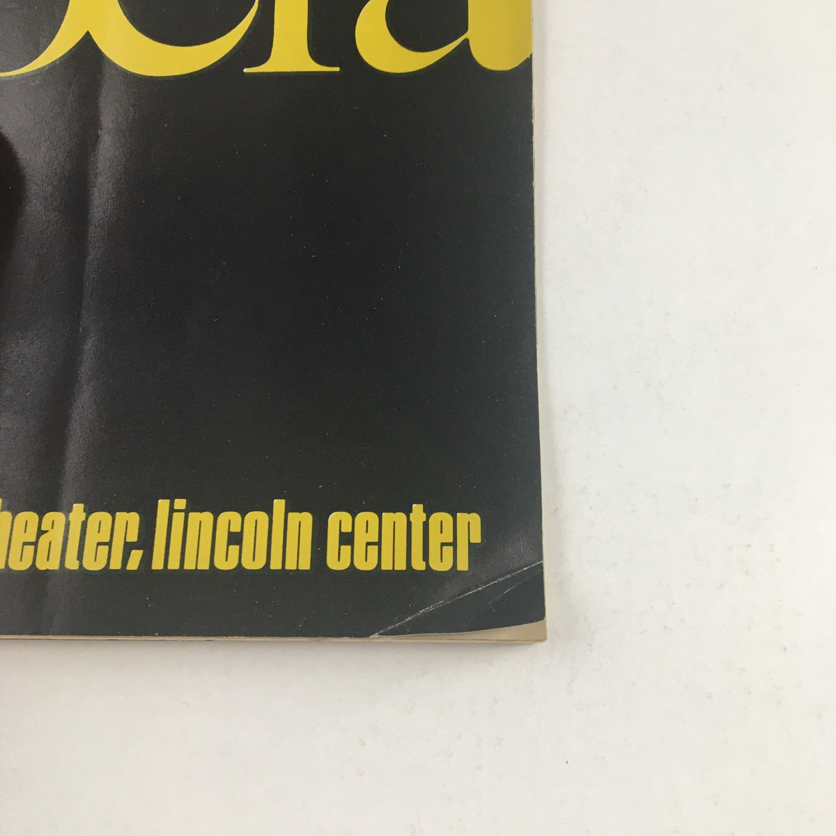 Close-up view of the 'Silent Patron of the Arts' program, highlighting the New York State Theater at Lincoln Center and the prominent title 'opera' in striking yellow letters.
