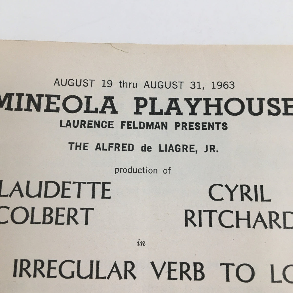 Cover page of the 1963 Stagebill for 'The Irregular Verb To Love' presented by Mineola Playhouse, highlighting the production's title and key contributors.