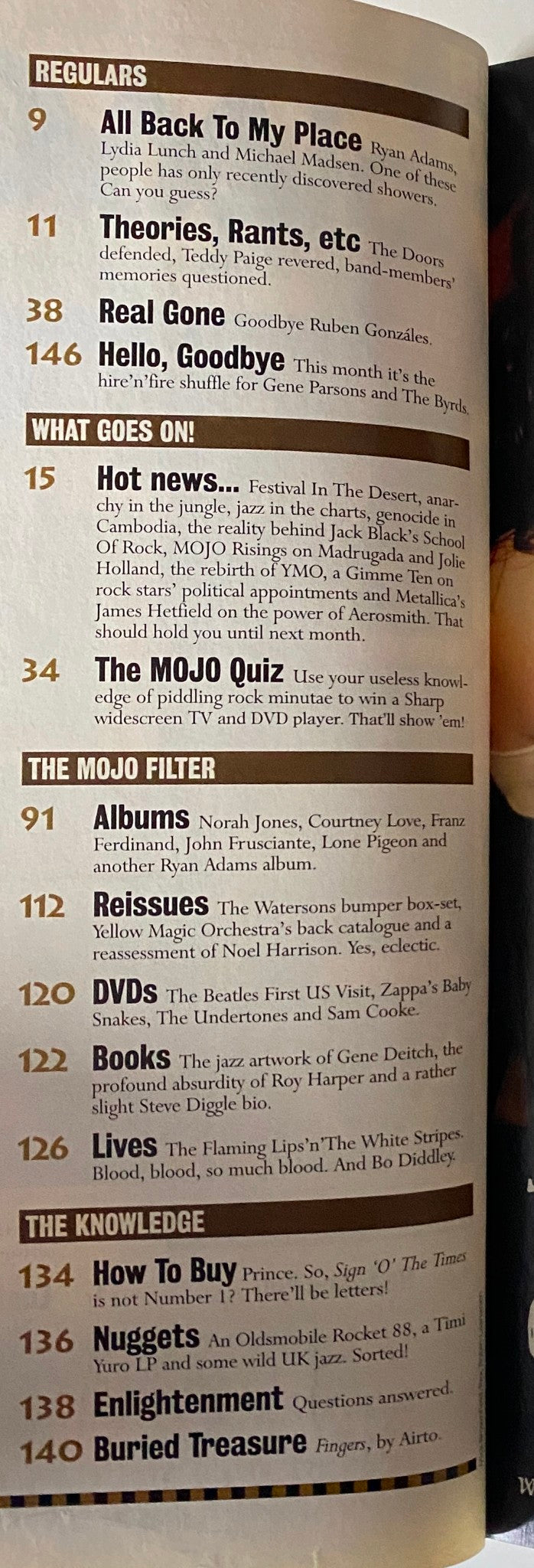 Regulars section from Mojo Music Magazine March 2004, listing articles covering music news, album reviews, and trivia, providing a glimpse into the diverse content of the issue.