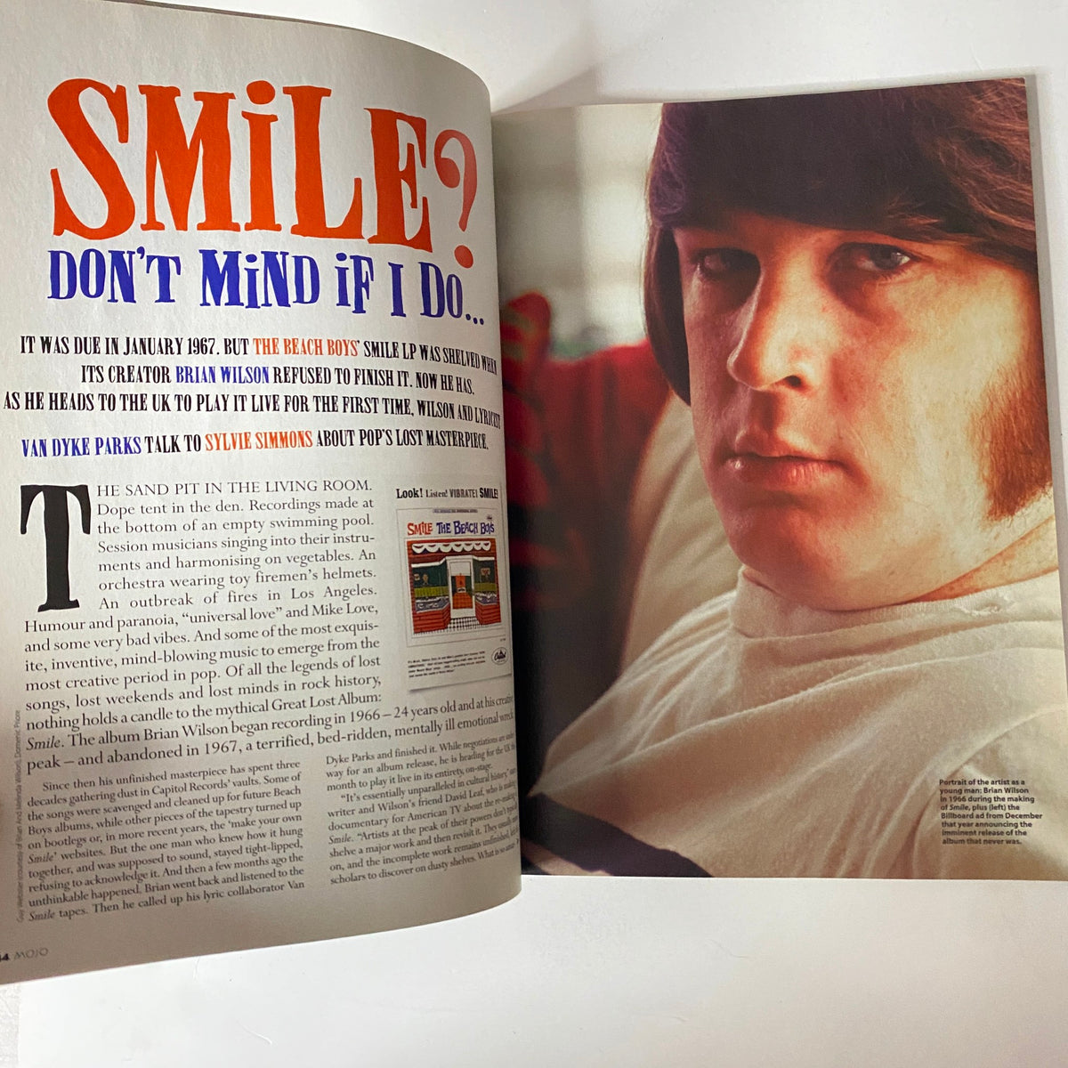 Interior spread from Mojo Music Magazine March 2004, focusing on Brian Wilson's 'Smile', presenting a captivating interview alongside images that explore the iconic work of the Beach Boys.