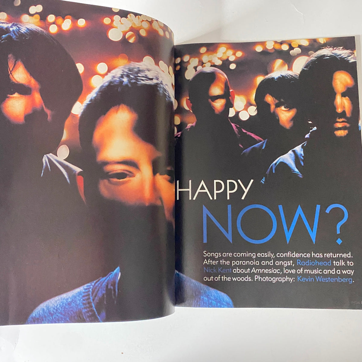 Double page spread from Mojo Music Magazine June 2001 featuring Radiohead with the title 'Happy Now?', capturing the band's introspective essence.