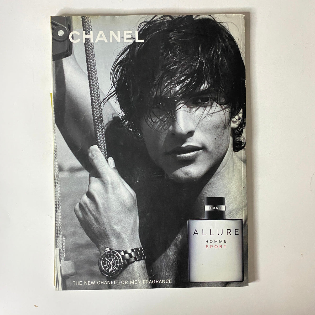 Cover image of a Chanel advertisement featuring a male model, unrelated to Mojo Music Magazine September 2004. The Beatles No CD Included No Label.