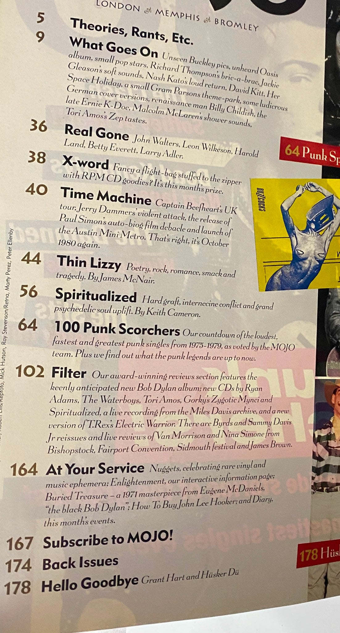 A close-up of the contents page of Mojo Music Magazine October 2001, detailing articles on punk music, including features on Thin Lizzy, Spiritualized, and a roundup of unseen photos and tributes.