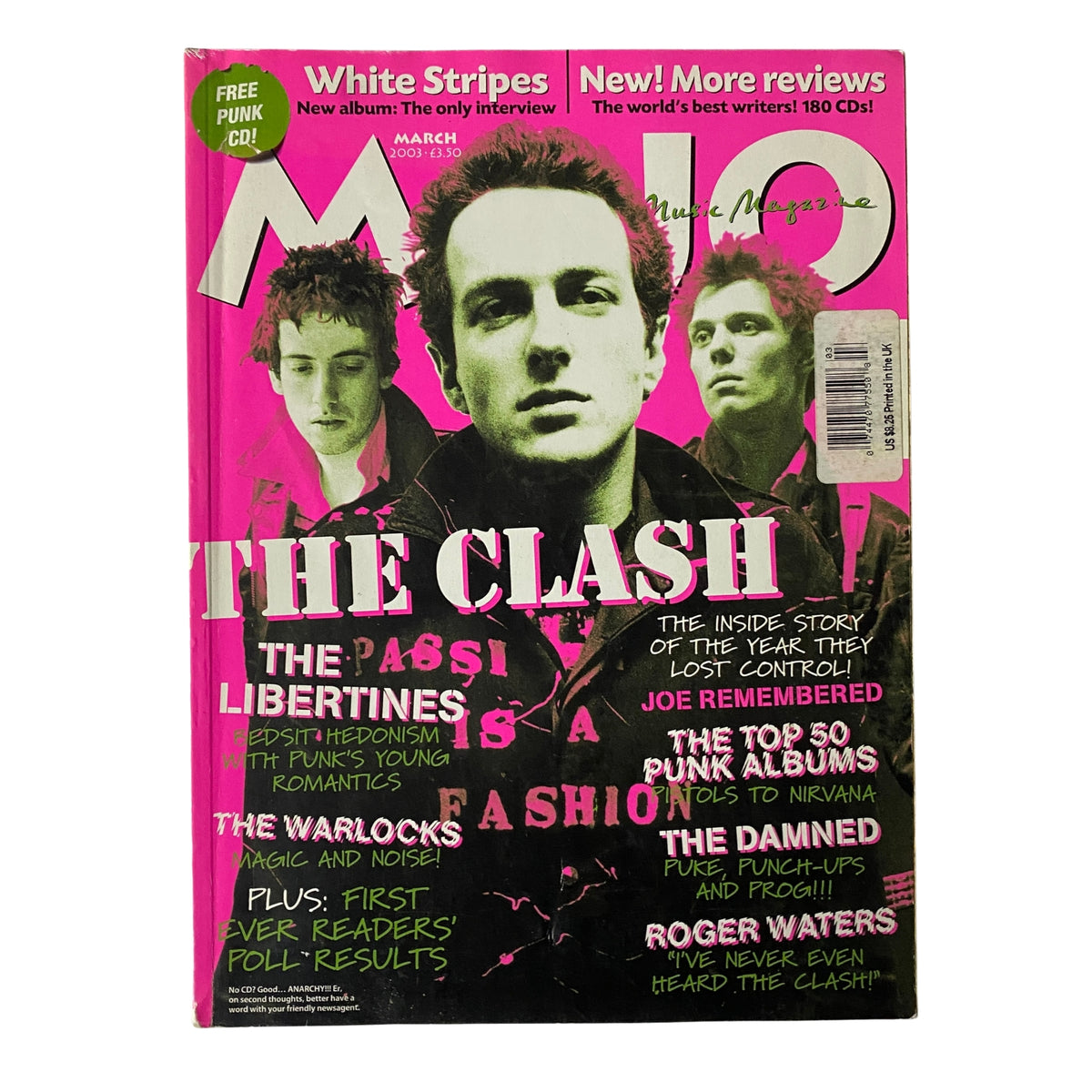 Mojo Music Magazine, March 2003 issue, featuring The Clash on the cover. The cover highlights iconic punk music elements and mentions features on The Libertines, The White Stripes, and more.