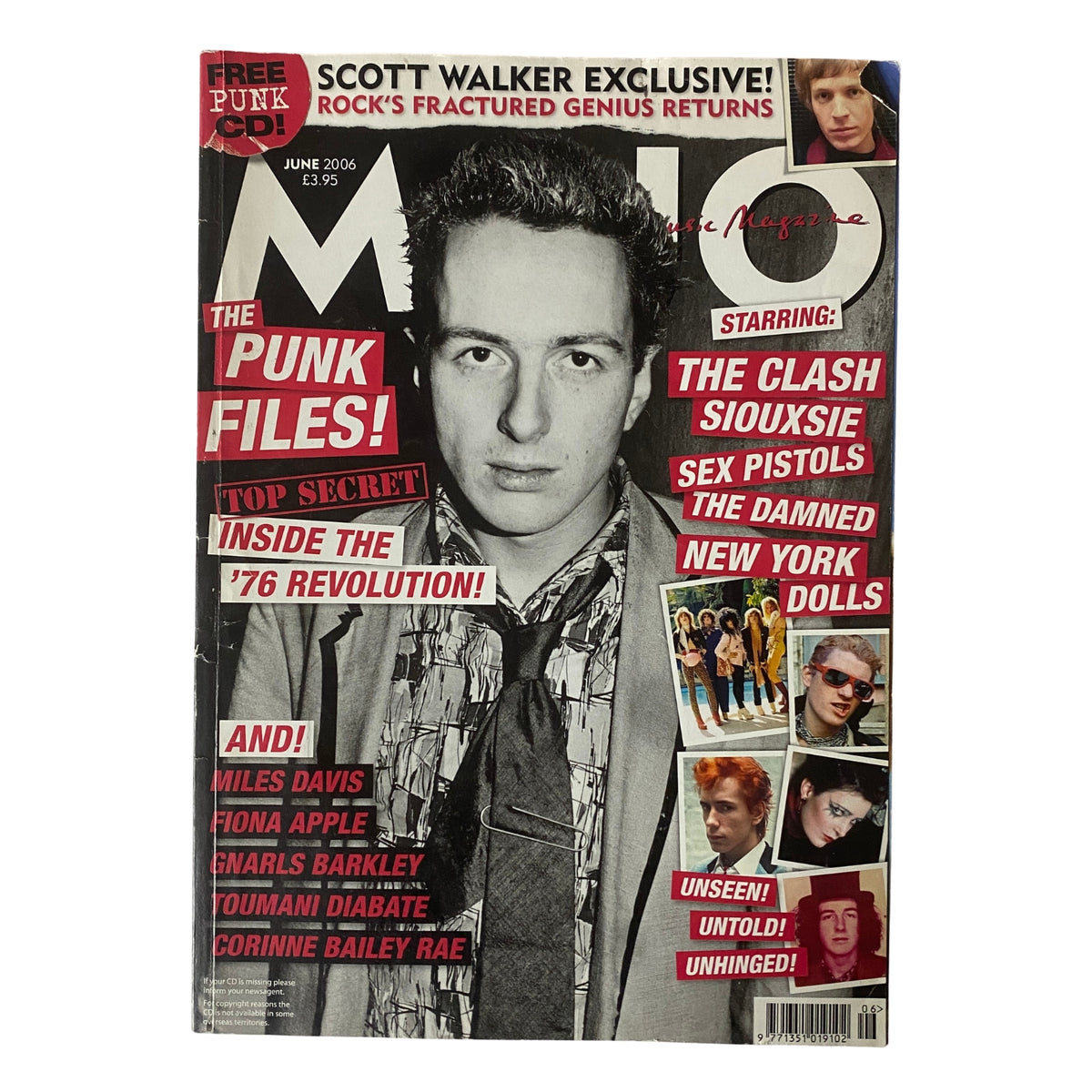 Mojo Music Magazine June 2006 featuring The Clash and Siouxsie, highlighting punk music culture, with an image of a young male model dressed in formal attire on the cover.