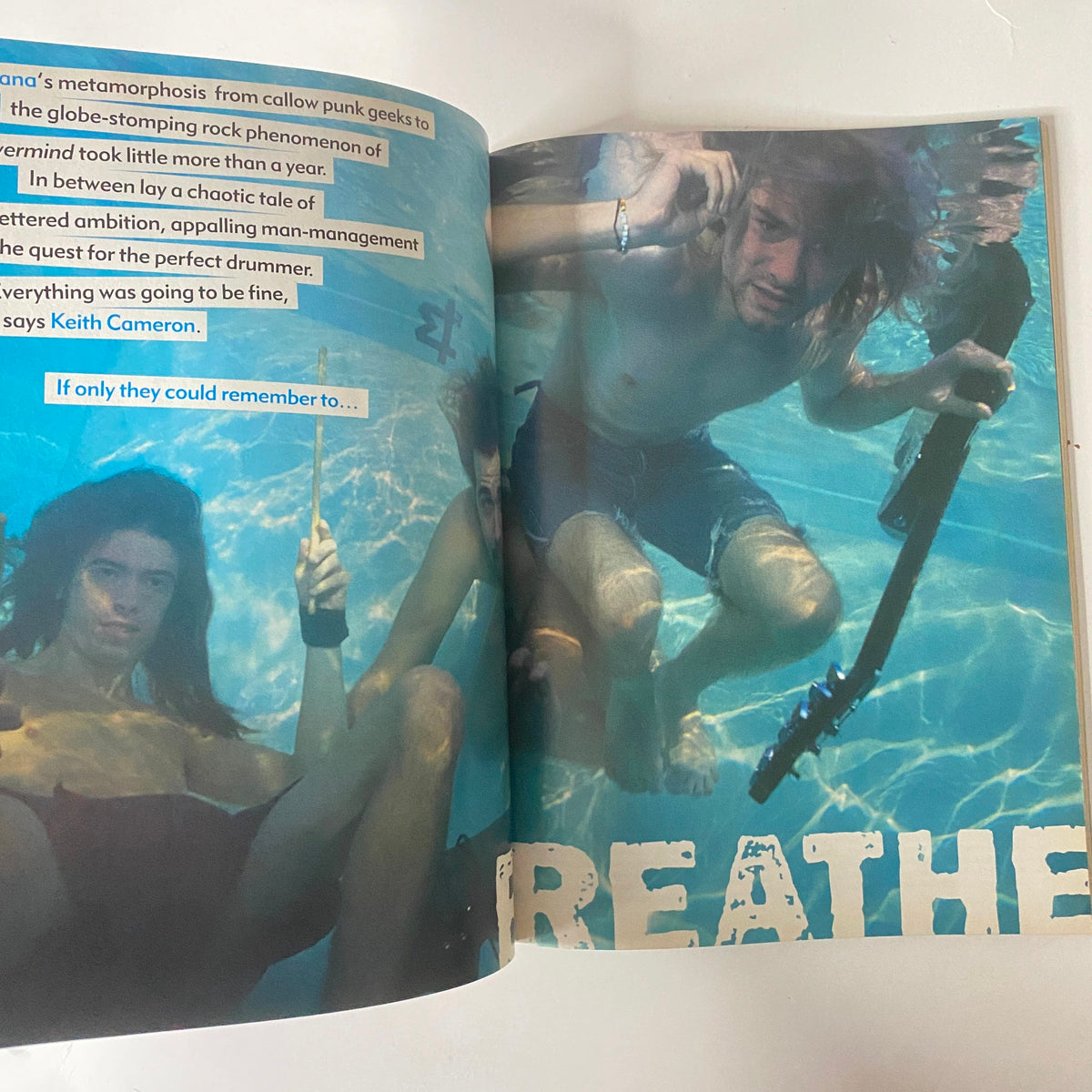 Interior page from Mojo Music Magazine January 2003 showcasing underwater photography with musicians, highlighting the theme 'Breathe'.