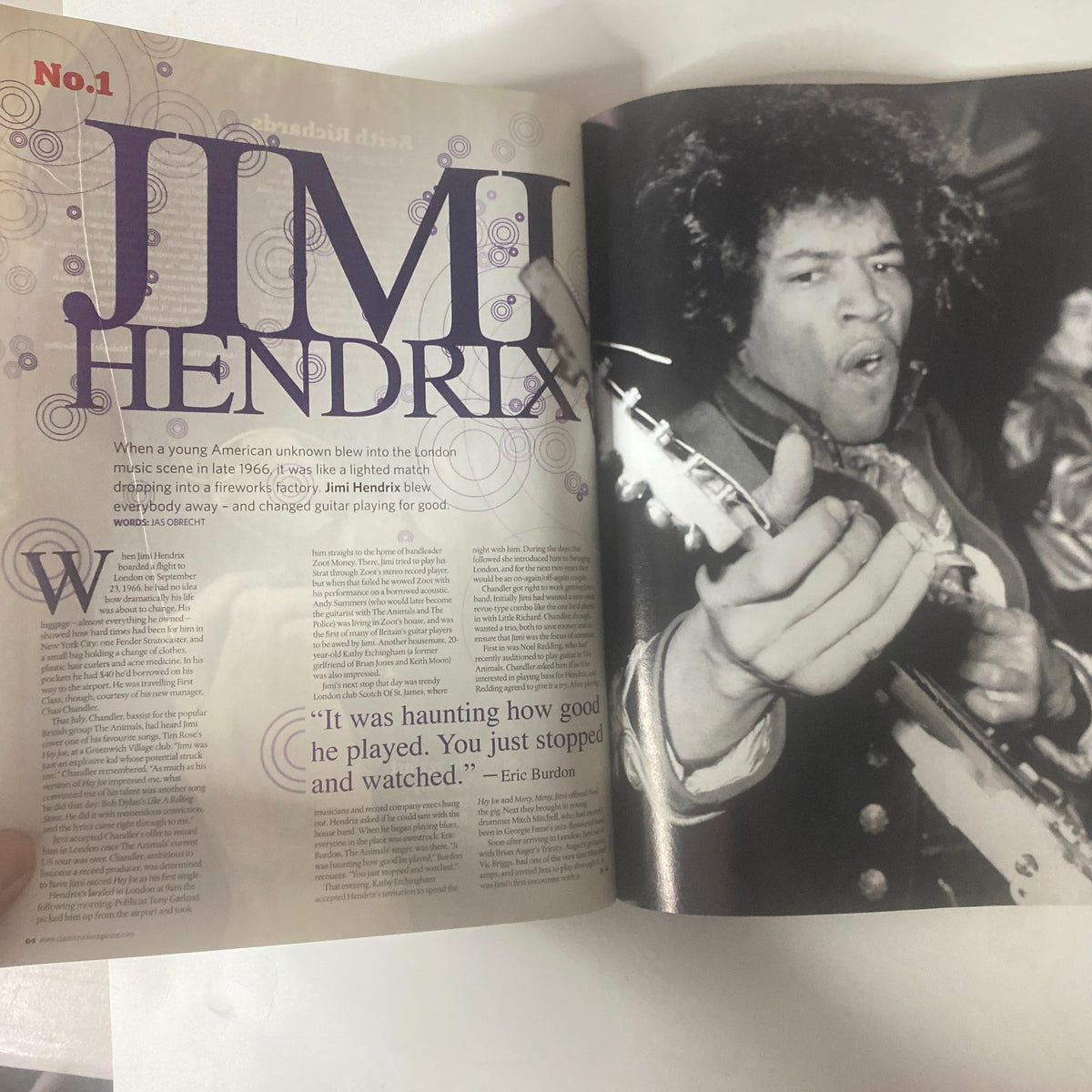 Jimi Hendrix feature article from Classic Rock Magazine April 2007, highlighting his impact on the music scene with a captivating portrait of him performing.