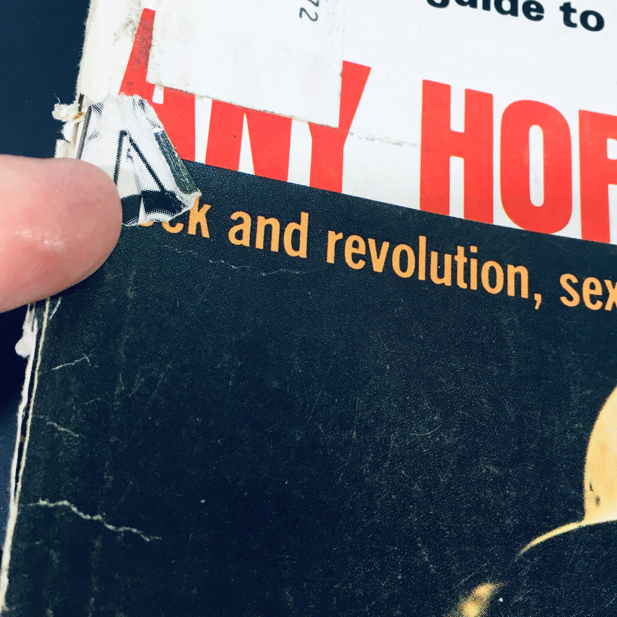 Close-up of the vintage High Fidelity Magazine from November 1971, highlighting the magazine's corner with minor wear and an address label affixed, showcasing its historical significance in music and audio technology.