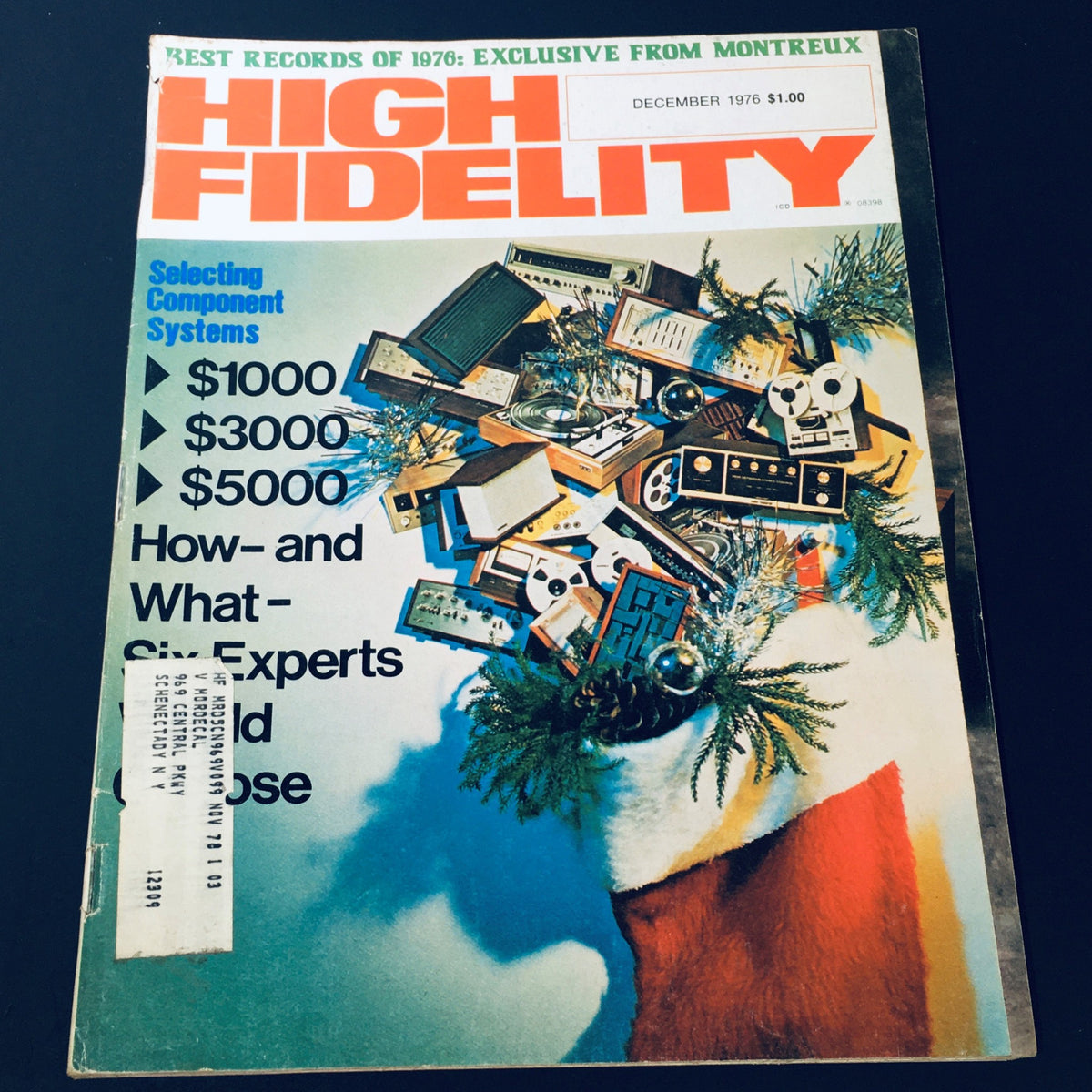 Cover of VTG High Fidelity Magazine December 1976 featuring a festive design with audio components, titled 'Selecting Component Systems', showcasing information on audio systems priced from $1000 to $5000.