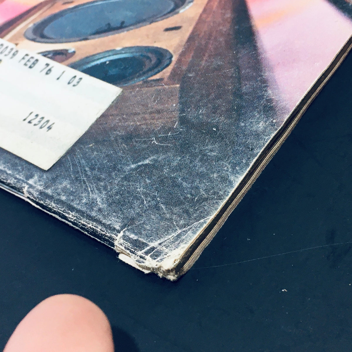 Close-up of the edge of VTG High Fidelity Magazine June 1975 showing minor wear and an address label, emphasizing the vintage condition of this collectible audio magazine.