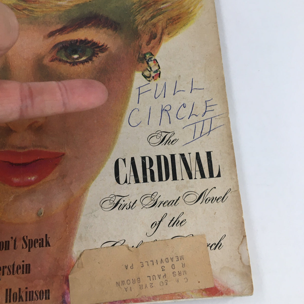 Detail of the cover of VTG Cosmopolitan Magazine September 1949, showcasing a handwritten note 'FULL CIRCLE' next to the illustration of a woman’s face.