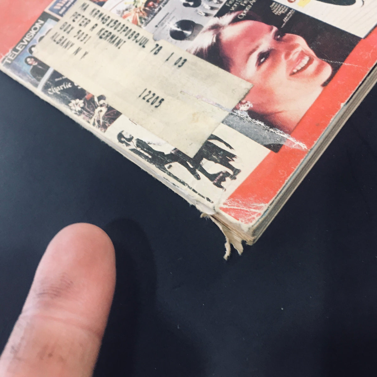 Close-up of the December 1977 issue of High Fidelity Magazine highlighting vintage design elements, including an address label and worn edges, showcasing its collectible status.
