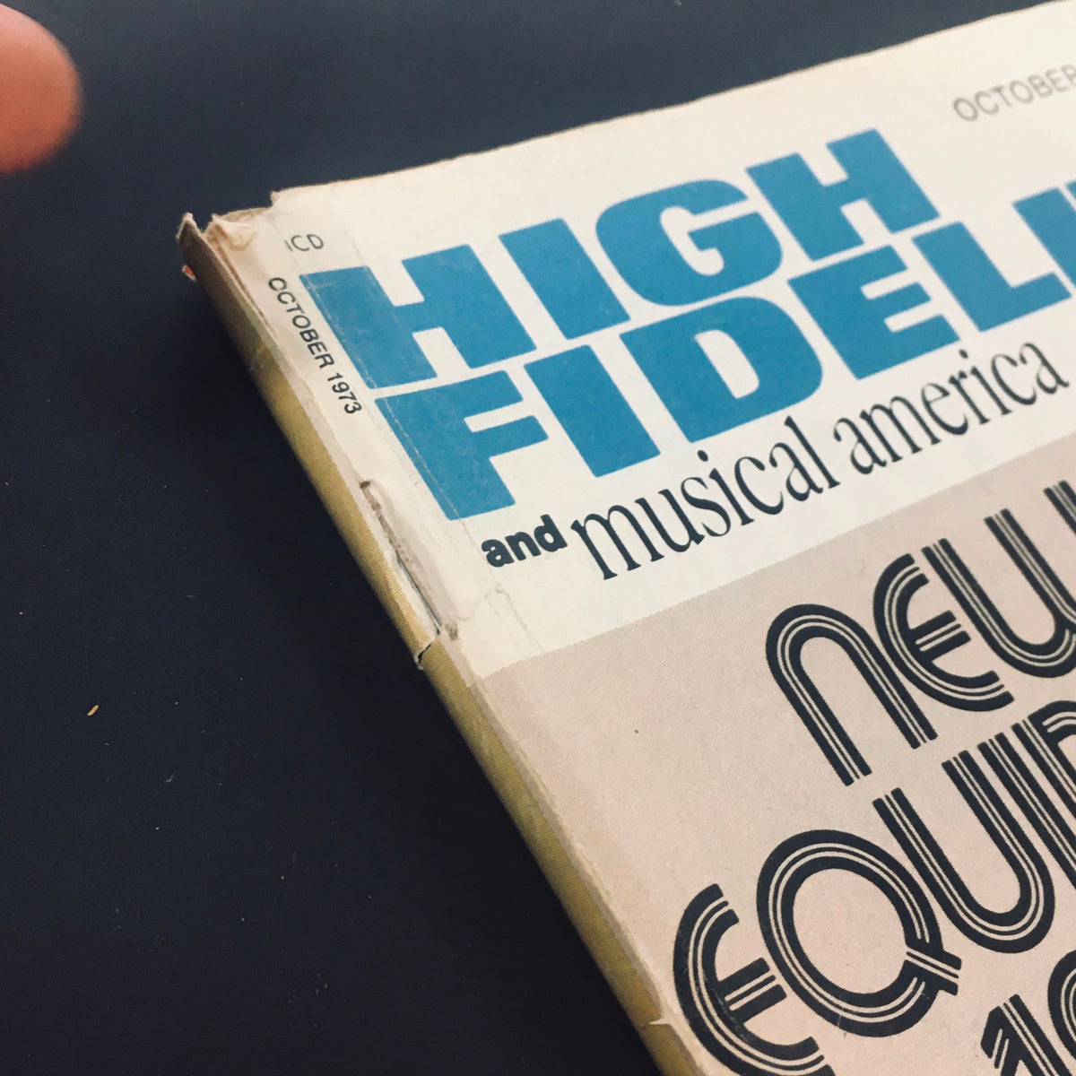 Detail shot of the spine of VTG High Fidelity Magazine October 1973 showcasing the publication's title and date.